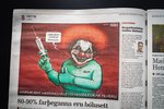 Blóðugur trúður með sprautunál í skopmynd Morgunblaðsins: „Þá er komið að börnunum“